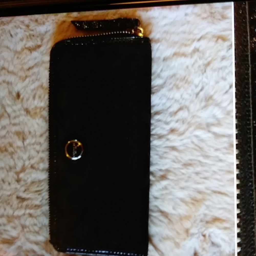 VGUC. Coach expandable black wallet